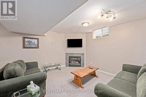 627 Fieldgate Circle, London, ON - Indoor Photo Showing Living Room With Fireplace