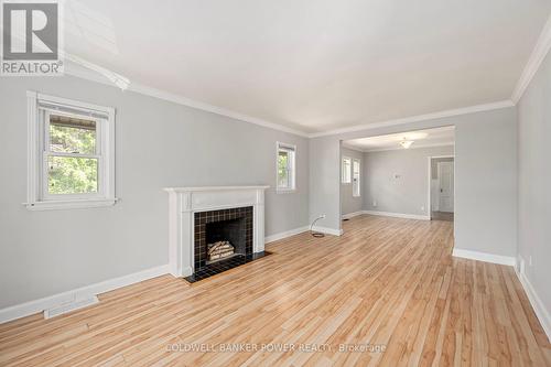 1090 Richmond Street, London, ON - Indoor Photo Showing Living Room With Fireplace