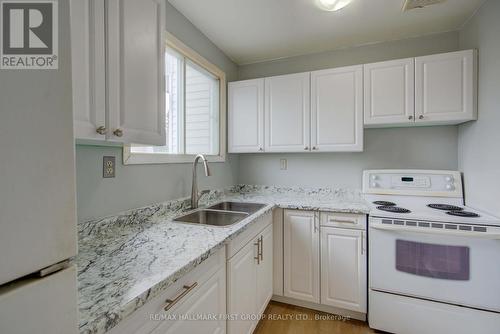 34 - 1033 Craig Lane, Kingston, ON - Indoor Photo Showing Kitchen With Double Sink