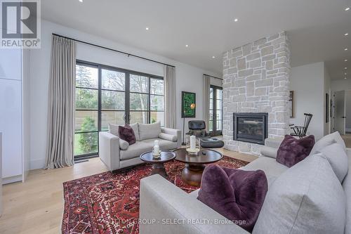 185 Commissioners Road E, London, ON - Indoor Photo Showing Living Room With Fireplace