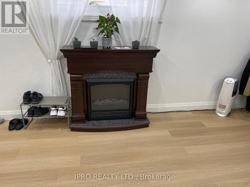 1512 Leda Avenue, Mississauga, ON - Indoor Photo Showing Living Room With Fireplace