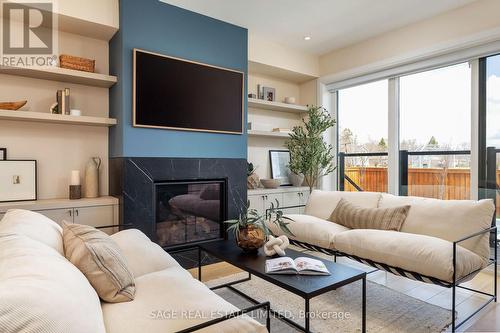 25 Delma Drive, Toronto, ON - Indoor Photo Showing Living Room With Fireplace