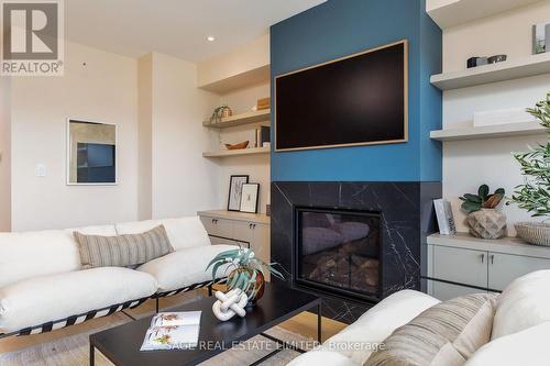 25 Delma Drive, Toronto, ON - Indoor Photo Showing Living Room With Fireplace