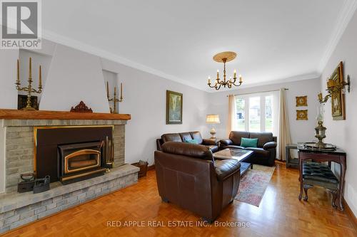 31 Mulock Drive, Bradford West Gwillimbury, ON - Indoor Photo Showing Living Room With Fireplace