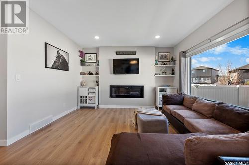 3751 Gee Crescent, Regina, SK - Indoor Photo Showing Living Room With Fireplace