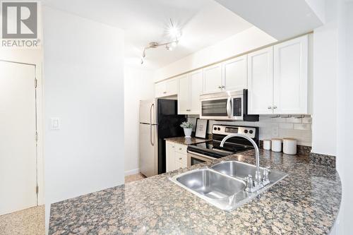 451 - 313 Richmond Street E, Toronto, ON - Indoor Photo Showing Kitchen With Double Sink