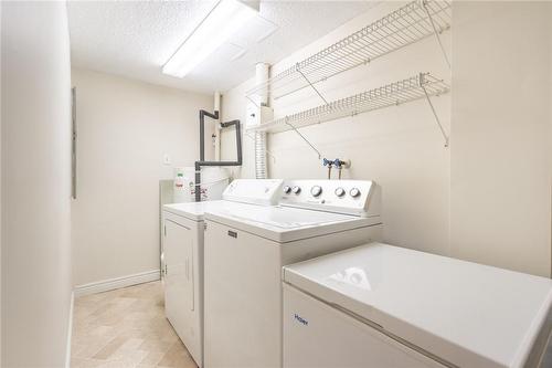 ensuite private laundry - 150 Wilson Street W|Unit #305, Ancaster, ON - Indoor Photo Showing Laundry Room