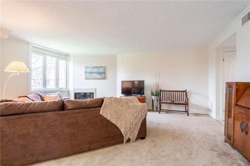 150 Wilson Street W|Unit #305, Ancaster, ON - Indoor Photo Showing Living Room With Fireplace
