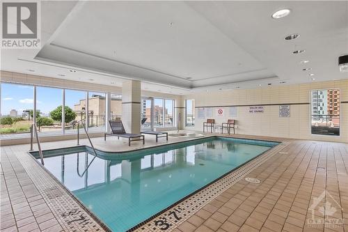 Salt water swimming pool. - 90 George Street Unit#402, Ottawa, ON - Indoor Photo Showing Other Room With In Ground Pool