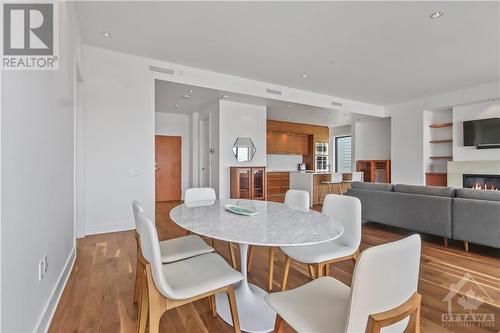 Open concept Dining, Living and Kitchen. - 90 George Street Unit#402, Ottawa, ON - Indoor With Fireplace
