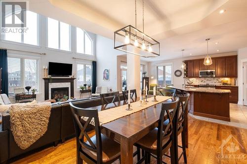 504 Mazari Crescent, Ottawa, ON - Indoor Photo Showing Dining Room With Fireplace