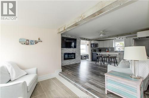141 Stead Lane, Pointe Du Chene, NB - Indoor Photo Showing Living Room With Fireplace
