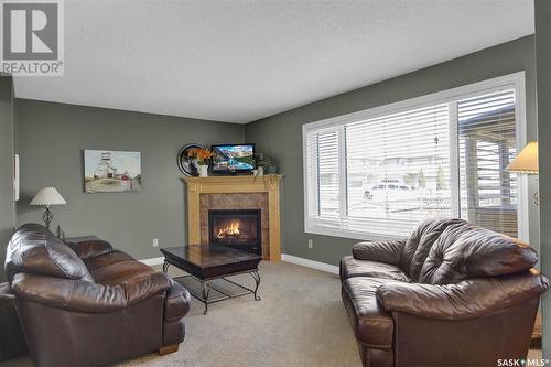 4834 Taylor Crescent, Regina, SK - Indoor Photo Showing Living Room With Fireplace