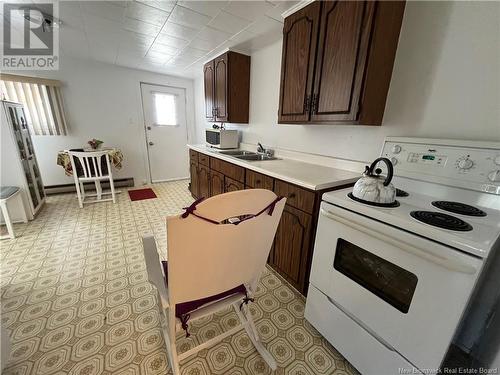 1 Veniot Street, Edmundston, NB - Indoor Photo Showing Kitchen With Double Sink