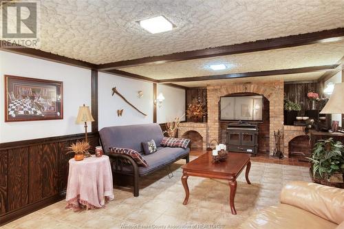1221 Roselawn Drive, Windsor, ON - Indoor Photo Showing Living Room With Fireplace