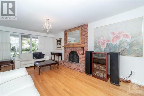 1682 Amberdale Crescent, Ottawa, ON - Indoor Photo Showing Living Room With Fireplace