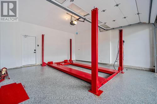 1420 Ford Strathy Crescent, Oakville, ON - Indoor Photo Showing Garage