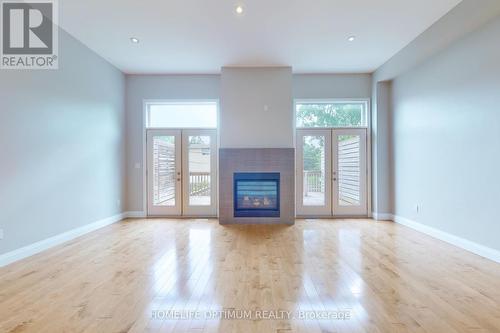 19 Twenty Sixth Street, Toronto, ON - Indoor Photo Showing Living Room With Fireplace
