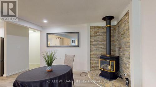 25 Cottonwood Crescent, London, ON - Indoor Photo Showing Dining Room With Fireplace
