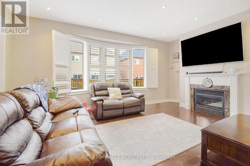 33 Orangeblossom Trail, Brampton, ON - Indoor Photo Showing Living Room With Fireplace