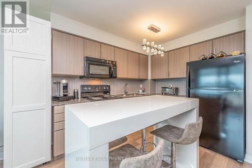 802 - 80 Esther Lorrie Drive, Toronto, ON - Indoor Photo Showing Kitchen With Double Sink
