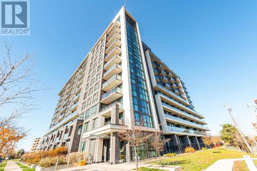 802 - 80 Esther Lorrie Drive, Toronto, ON - Outdoor With Balcony With Facade