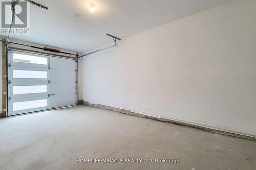 1544 Hilson Heights, Milton, ON - Indoor Photo Showing Garage