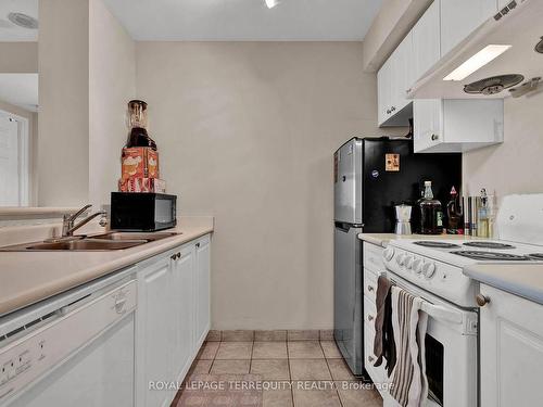 1215-1 Lee Centre Dr, Toronto, ON - Indoor Photo Showing Kitchen With Double Sink