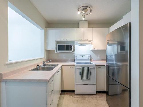 306-2227 James White Blvd, Sidney, BC - Indoor Photo Showing Kitchen With Double Sink