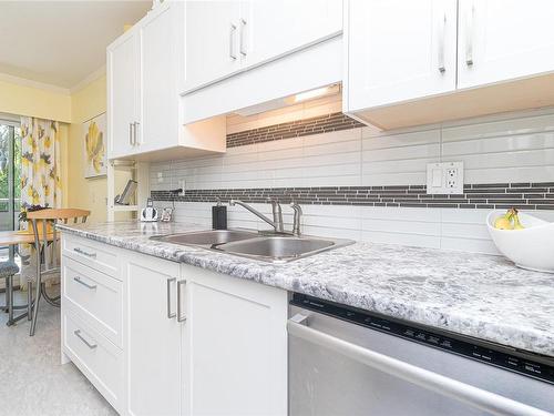 304-1665 Oak Bay Ave, Victoria, BC - Indoor Photo Showing Kitchen With Double Sink With Upgraded Kitchen