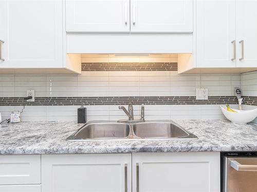 304-1665 Oak Bay Ave, Victoria, BC - Indoor Photo Showing Kitchen With Double Sink With Upgraded Kitchen