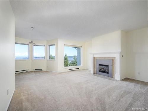934 Highview Terr, Nanaimo, BC - Indoor Photo Showing Living Room With Fireplace