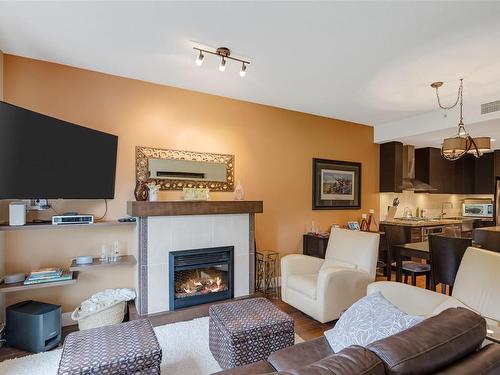 215-1400 Lynburne Pl, Langford, BC - Indoor Photo Showing Living Room With Fireplace