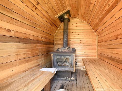 790 Spruce Street, Blue River, BC - Indoor Photo Showing Other Room With Fireplace