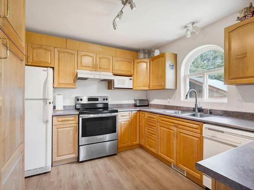 790 Spruce Street, Blue River, BC - Indoor Photo Showing Kitchen With Double Sink