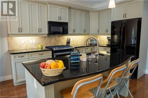 Island with Quartz Countertop - 56 Boiler Beach Road, Huron-Kinloss, ON - Indoor Photo Showing Kitchen