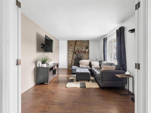 Salon - 31 Rue Casgrain, L'Ange-Gardien, QC - Indoor Photo Showing Living Room With Fireplace