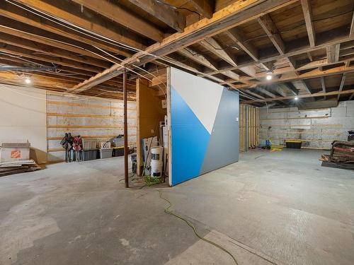 Salle familiale - 31 Rue Casgrain, L'Ange-Gardien, QC - Indoor Photo Showing Basement