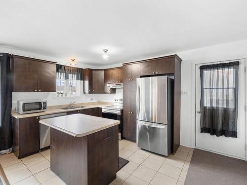 Cuisine - 31 Rue Casgrain, L'Ange-Gardien, QC - Indoor Photo Showing Kitchen With Double Sink