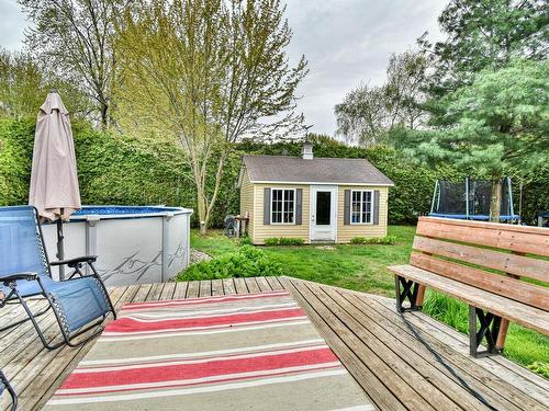 Backyard - 29 9E Avenue, Sainte-Marthe-Sur-Le-Lac, QC - Outdoor With Above Ground Pool With Backyard