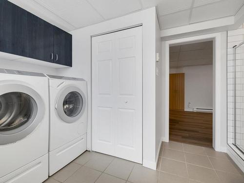 Salle de lavage - 50 Rue Yvon-Cousineau, Blainville, QC - Indoor Photo Showing Laundry Room