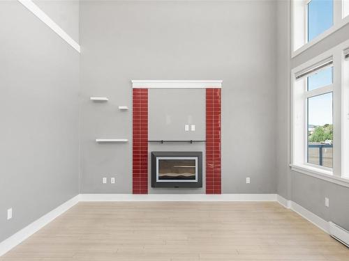 401-606 Speed Ave, Victoria, BC - Indoor Photo Showing Other Room With Fireplace