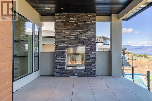 5624 Mountainside Drive, Kelowna, BC - Outdoor With Fireplace With Exterior