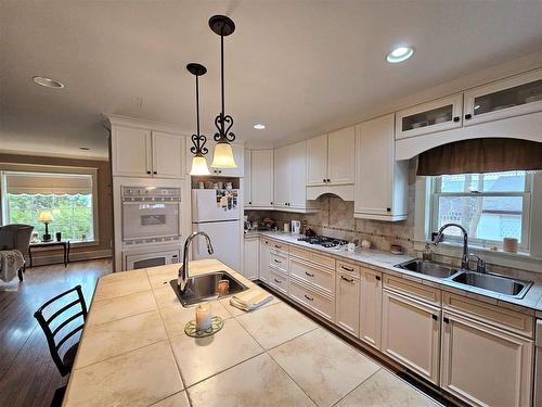 118 Front Street, Emo, ON - Indoor Photo Showing Kitchen With Double Sink