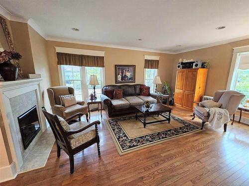 118 Front Street, Emo, ON - Indoor Photo Showing Living Room With Fireplace