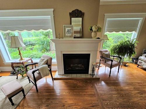 118 Front Street, Emo, ON - Indoor Photo Showing Living Room With Fireplace