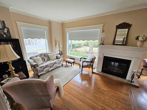 118 Front Street, Emo, ON - Indoor Photo Showing Living Room With Fireplace