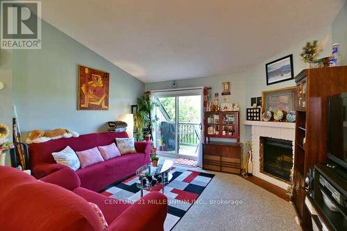 171 Escarpment Crescent, Collingwood, ON - Indoor Photo Showing Living Room With Fireplace