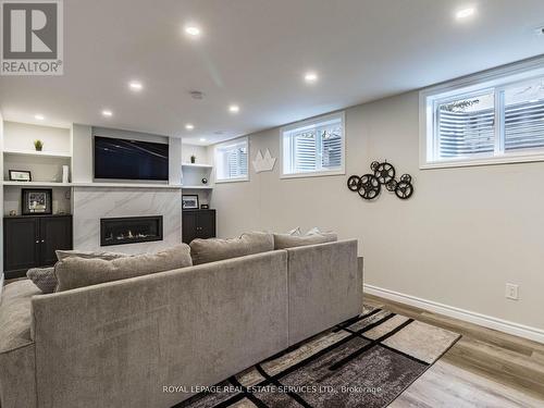 67 Centre Street S, Brampton, ON - Indoor Photo Showing Basement With Fireplace