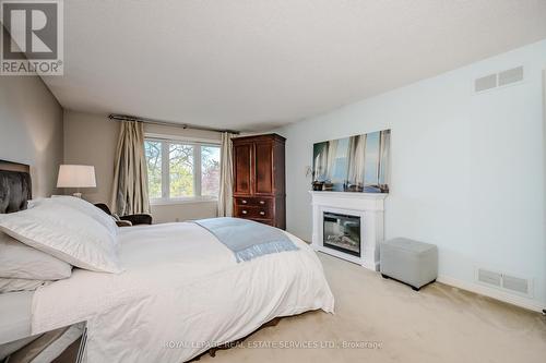 1274 Fairmeadow Trail, Oakville, ON - Indoor Photo Showing Bedroom With Fireplace